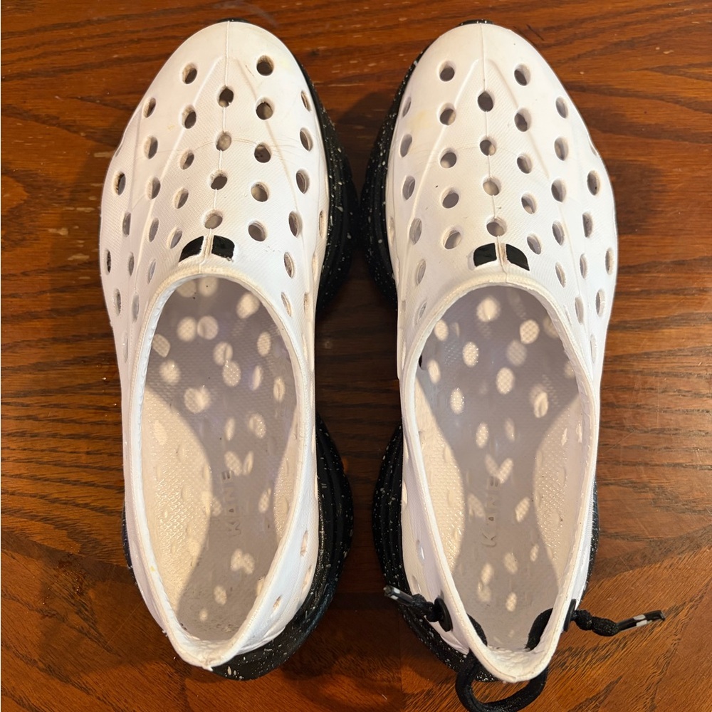 Women’s White Perforated Slip-On Athletic Shoes with Black Sole